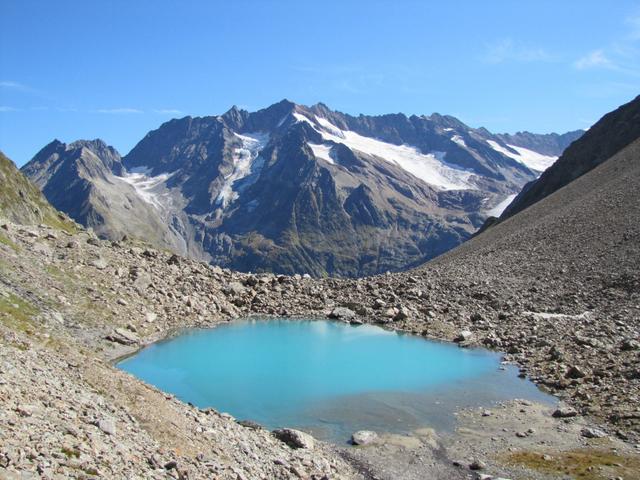 der Tällisee. Im Hintergrund Vorder-, Mittler- und Hinter Tierberg und Maasplanggstock