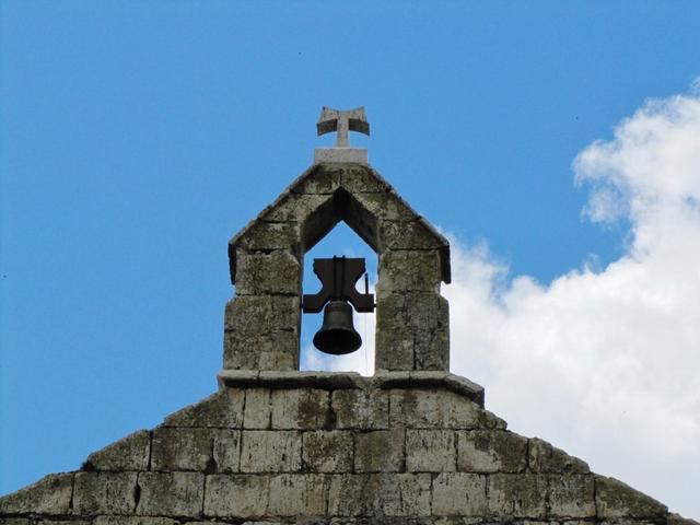 überall sieht man das "Tau" wie hier auf dem Kirchturm