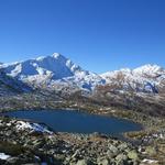 ... der Unterer Surettasee mit Pizzo Tambo und Guggernüll entdeckt