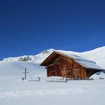 bei dieser Alphütte Treien 1887 m.ü.M. direkt neben der Skipiste...