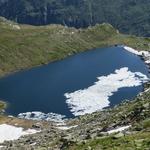 einige letzte Eisinseln sind auf dem Lago d'Orsino zu erkennen