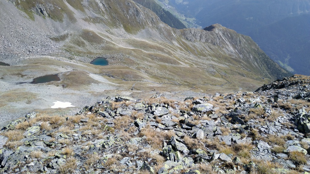 Blick ins Val Glims mit dem kleinen blauen Lai Glims und weiter unten die Linard Hütte