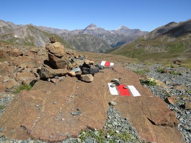 ...Metallen (z. B. Kupfer, Eisen) hindeutet, die dem Gestein durch Oxidation seine auffälligen Farben verleihen