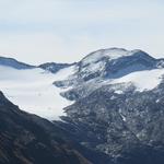 am Talende des Val Fedoz mit dem Monte dell'Oro und Fedoz Gletscher. Grenze zu Italien