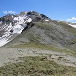 am Horizont erscheint der Berg, der gleich zwei Namen trägt: Piz la Stretta oder, auf Italienisch Monte Breva