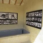 beim renovierten Waschhaus von Collecchio sind Fotos von früheren Zeiten aufgestellt