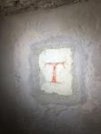 ...das Tau Zeichen, das San Francesco eigenhändig in die Wand gekrizelt hat